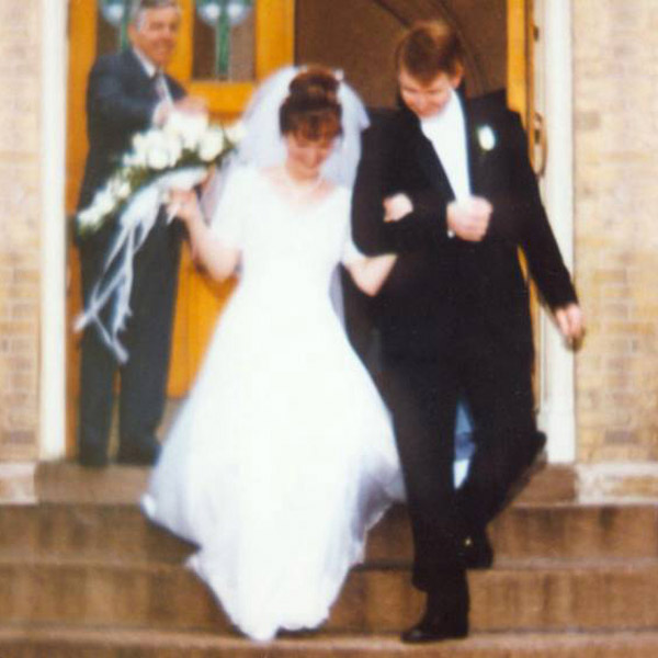 CArol and Mike as they leave the church on their wedding day